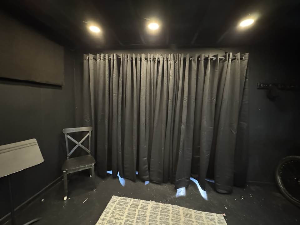 Lesson room with curtains and chair